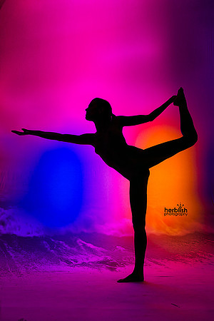Sunrise Yoga poses off the shore of Orion